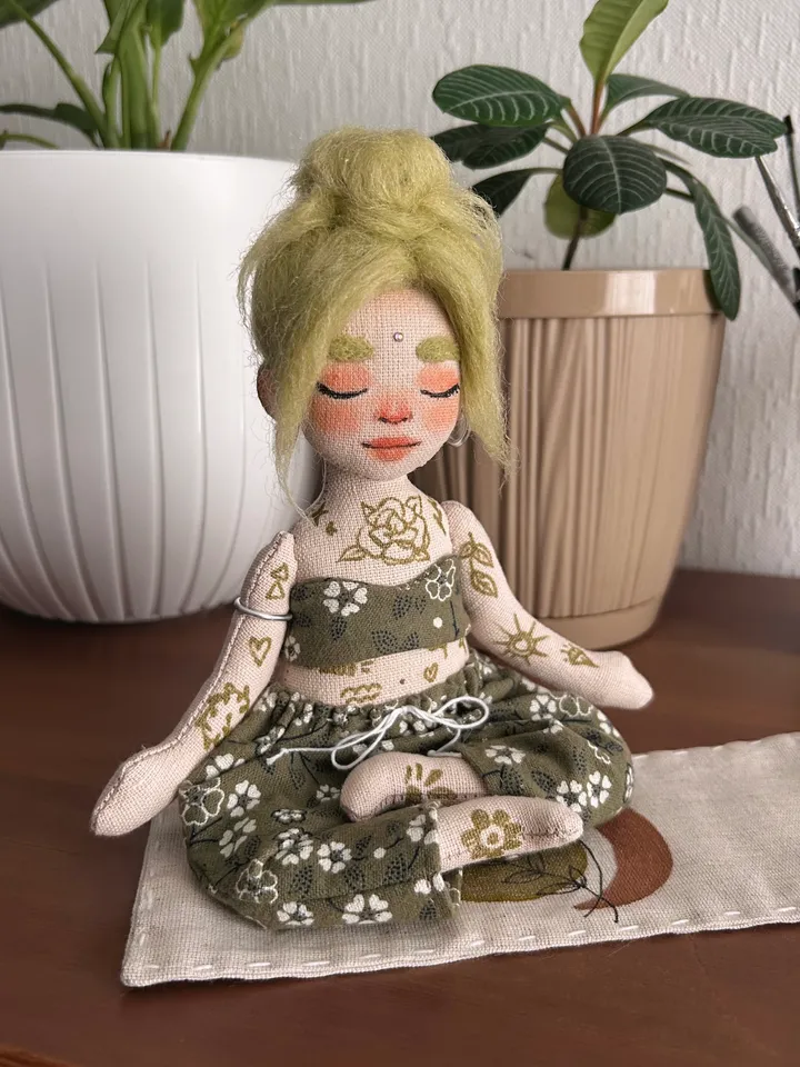 Textile doll yoga girl with green hair and tattoo