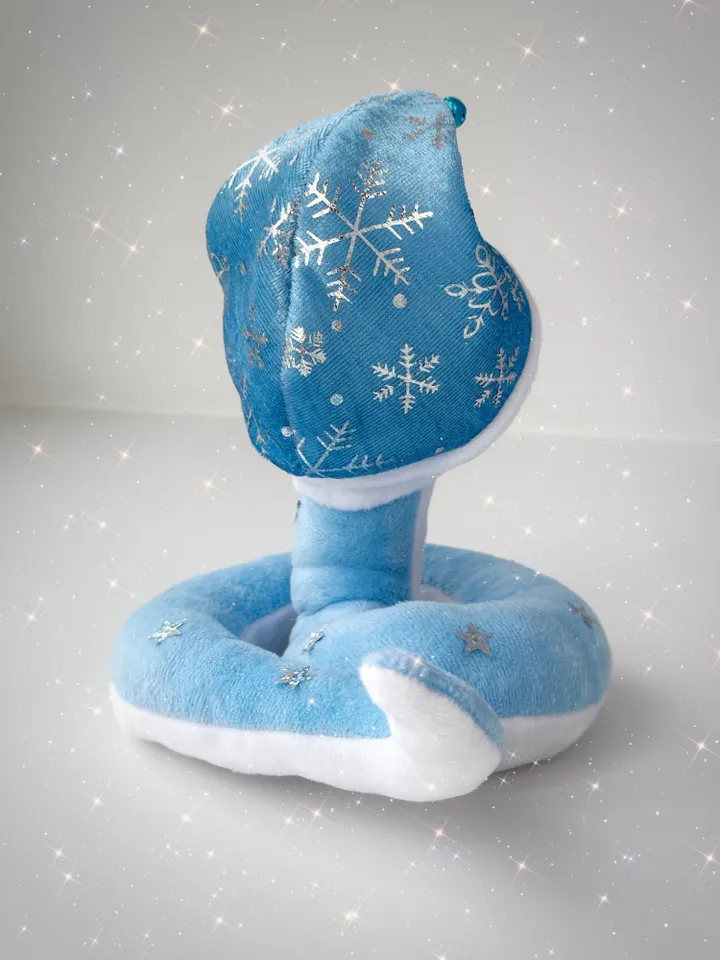 Christmas plush soft snake. Handmade cute snake boy in holiday hat for home decor. Christmas snake for gift.