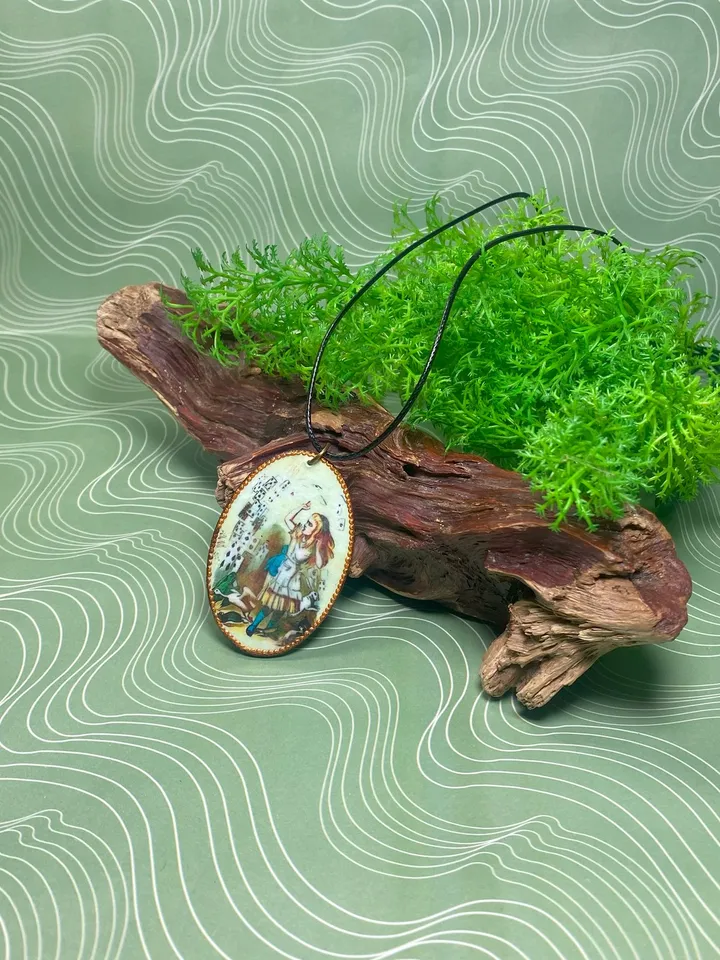 Handmade jewelry. Pendant in the style of "Alice".