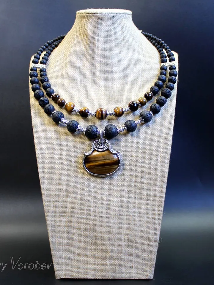 Necklace made of natural stones volcanic lava and tiger eye.