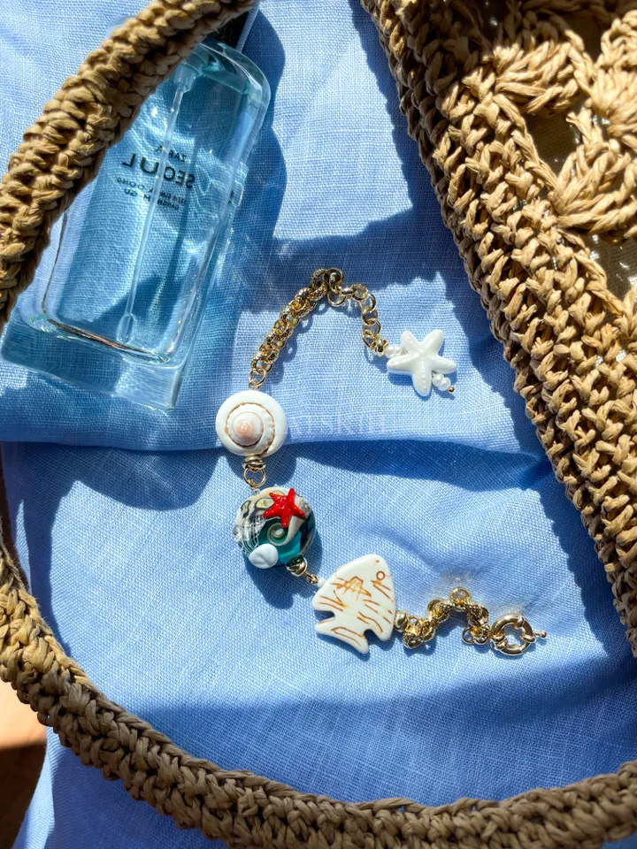 Unique Charm Bracelet with Natural Seashell