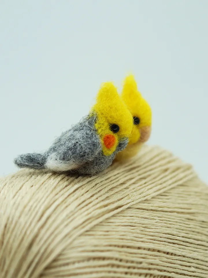 A pair of tiny needle felted miniature cockatiels, made to order