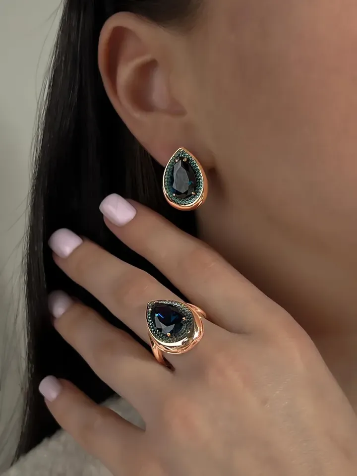 Ring silver 925, gold plated with London topaz and emeralds