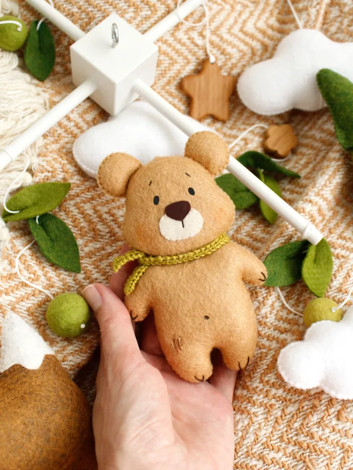 Felt woodland bear with clouds, spruce tree and mountain baby crib mobile hand sewing PDF tutorial with patterns. DIY forest nursery baby cot decoration
