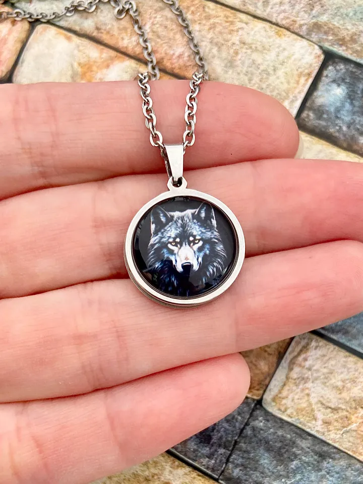 Black wolf, steel pendant with glass