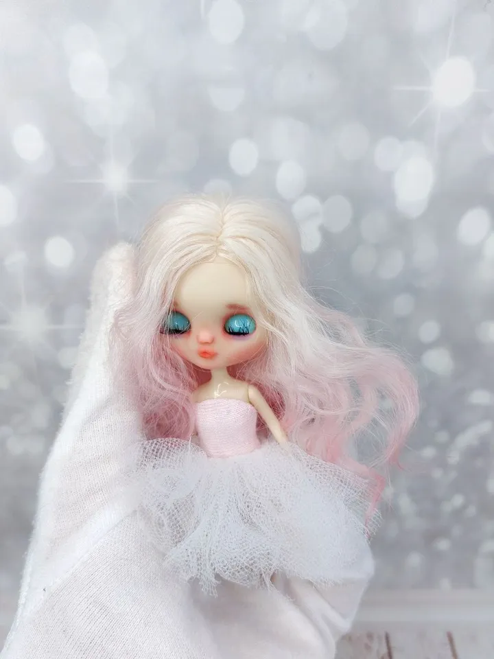 Petite Blythe doll with pink hair. Small doll with eye mechanism. Doll with a kiss.