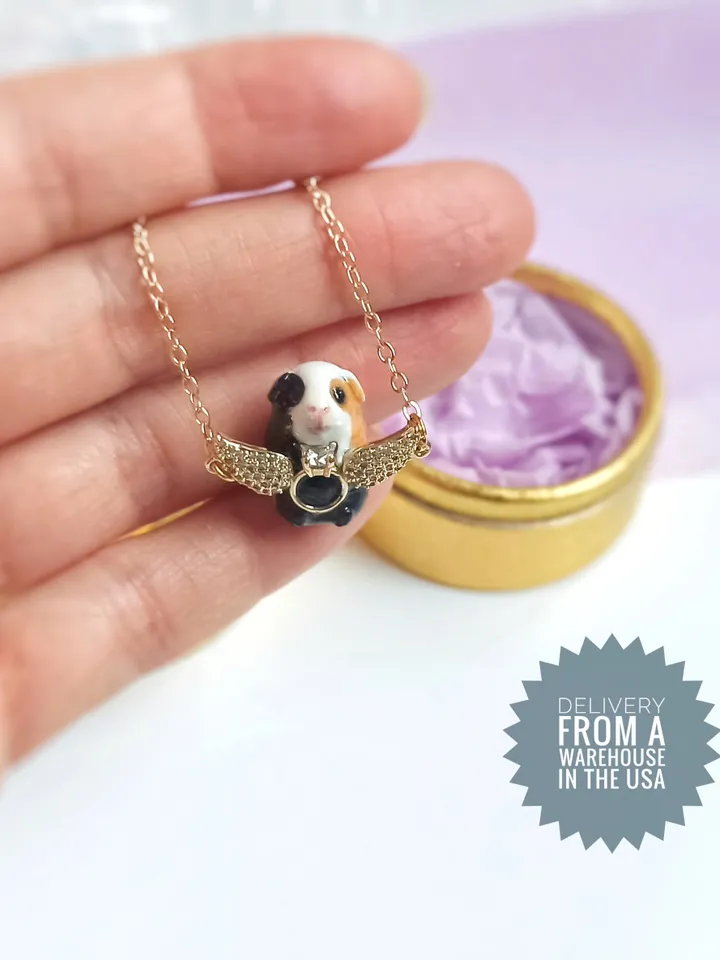 Handmade guinea pig pendant, adorned with rhinestones and gold wings (US discount)