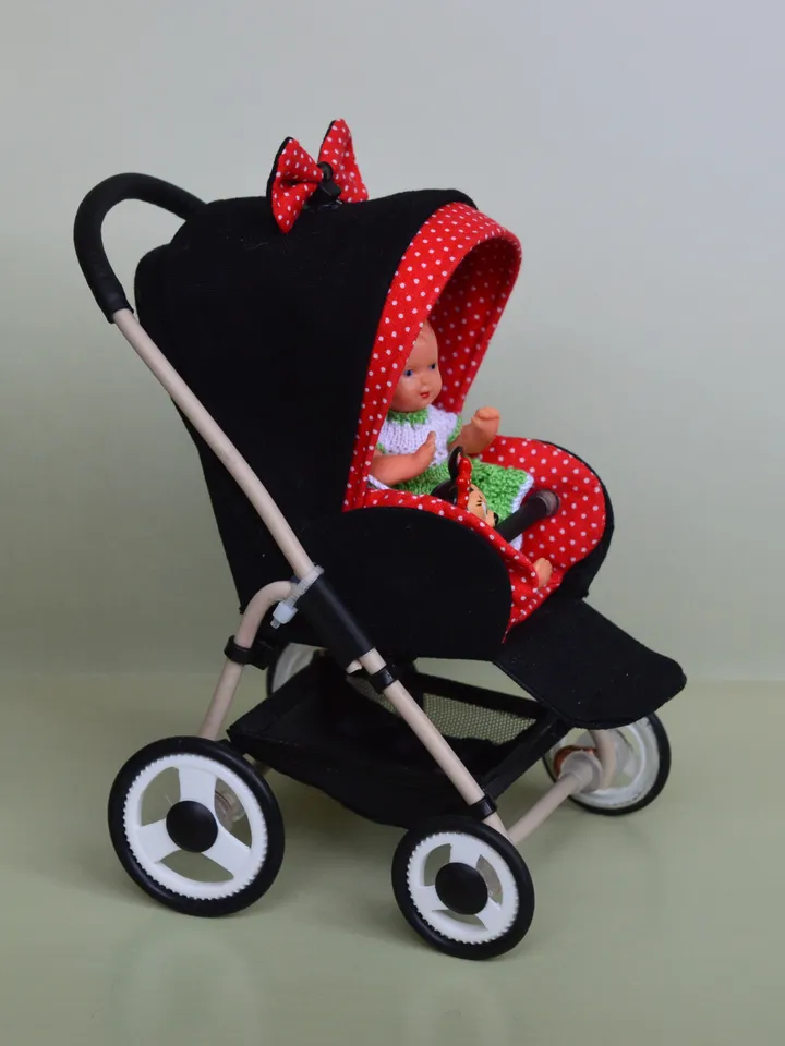 Miniature toy stroller for dolls in 1/6 scale. Accessories for small dolls and poupins. Pram for Barbie doll.