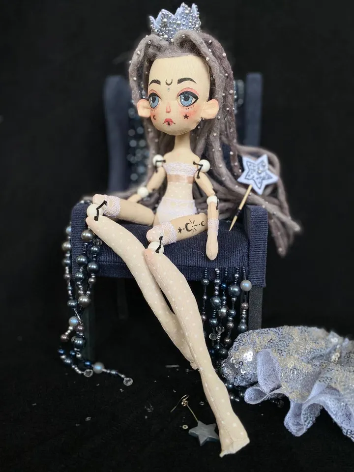 White Queen doll with dreadlocks and tattoos
