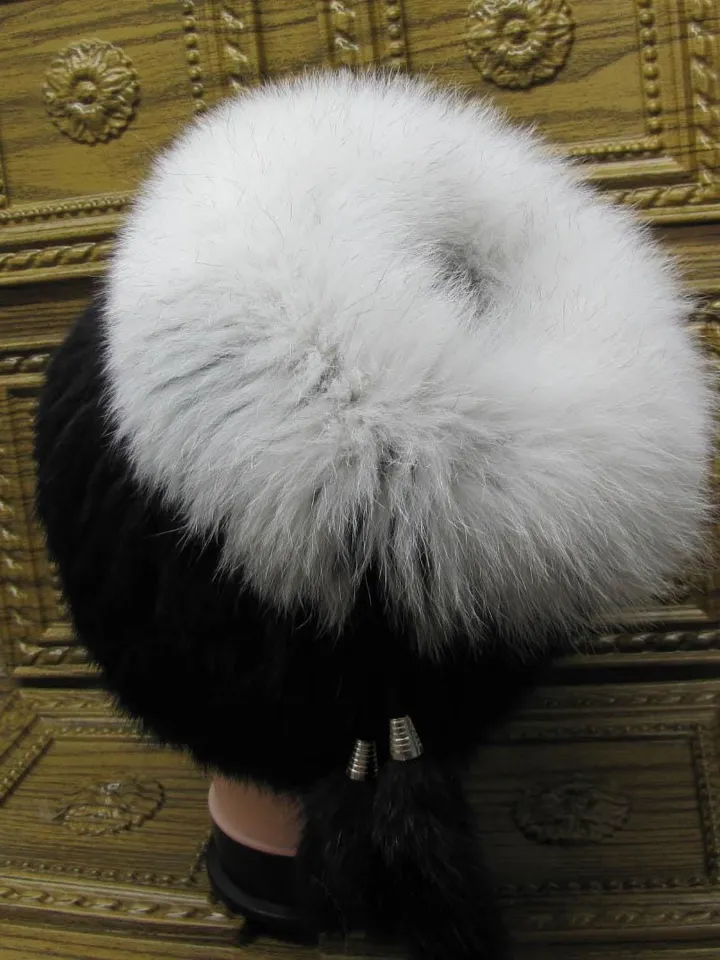 Women's fur hat made of natural rabbit fur. Rabbit hat with arctic fox. Women's winter hat, fur accessory. Rabbit and arctic fox fur.