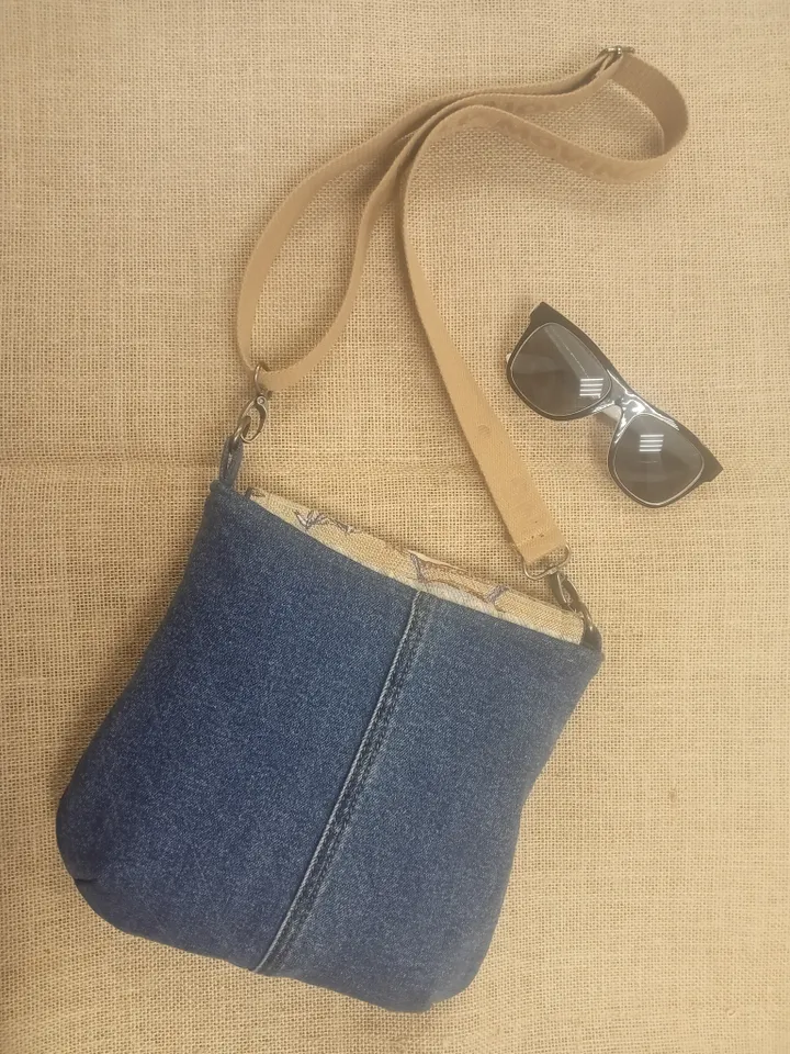 Cute crossbody denim bag, a women's messenger bag with a tapestry flap with a marine theme pattern and denim shoulder bag with 4 pockets inside and an adjustable strap.