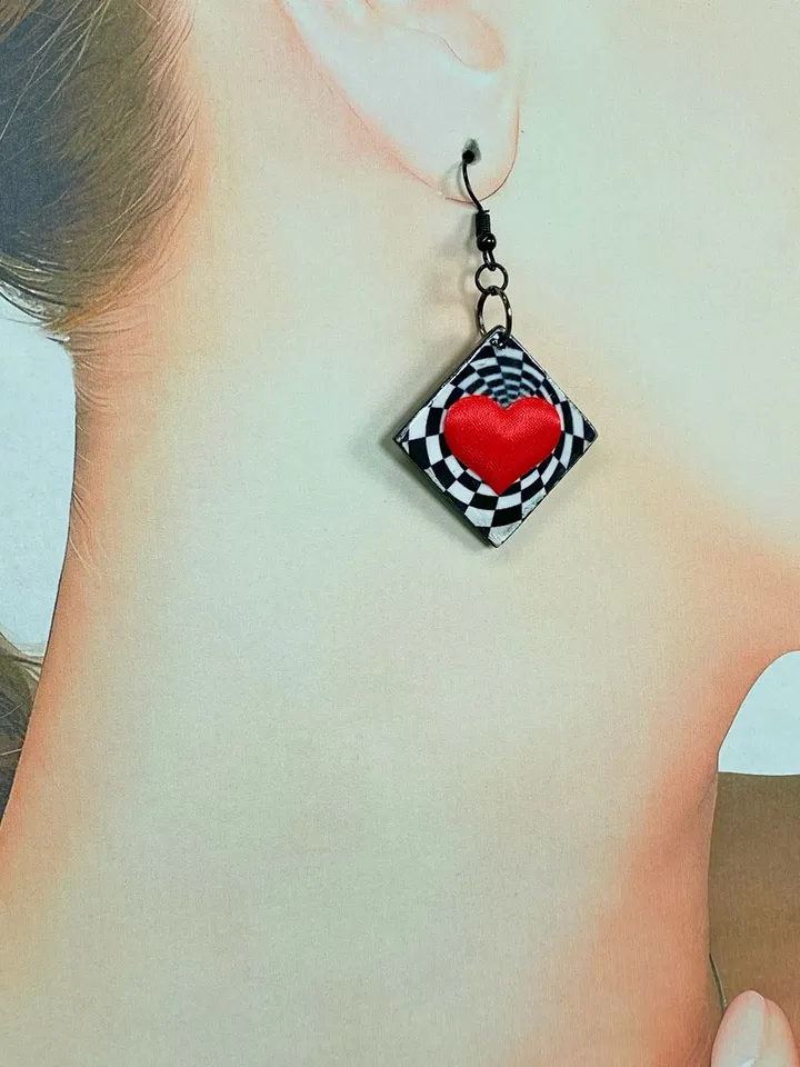 Bright handmade earrings. Handmade jewelry. Author's design. Earrings with bright hearts.