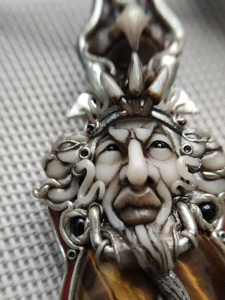 Necklace Shaman on a leather cord. Central cabochon natural tiger eye stone.