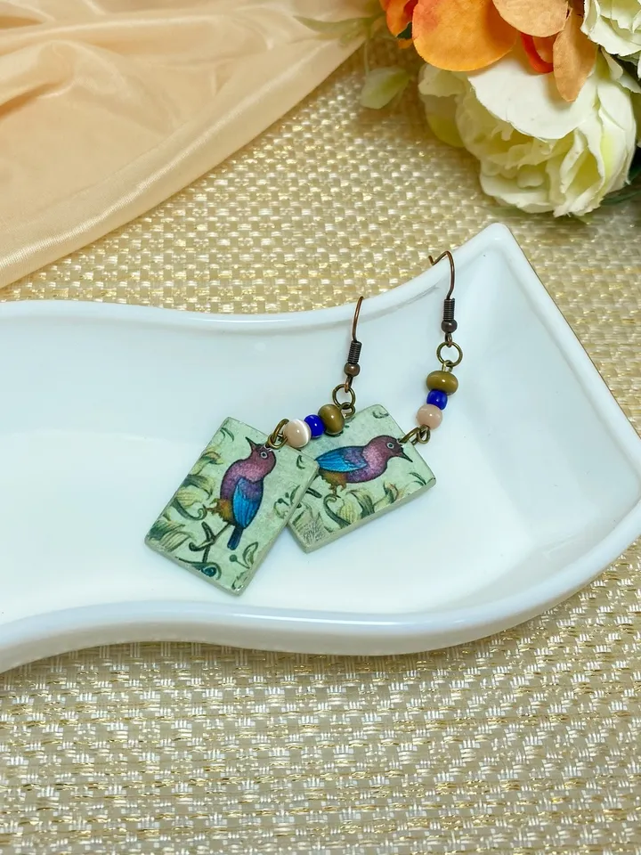 Vintage handmade earrings. Earrings with images of birds.