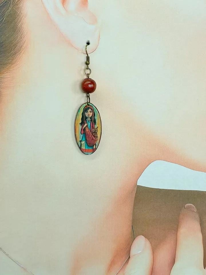 Handmade earrings. Author's design. Jewelry.Earrings with a picture of a girl. Wooden earrings.