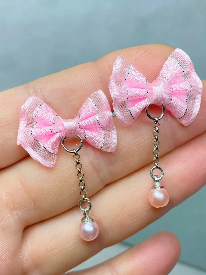 Handmade bow earrings. Author's work. Bright jewelry.