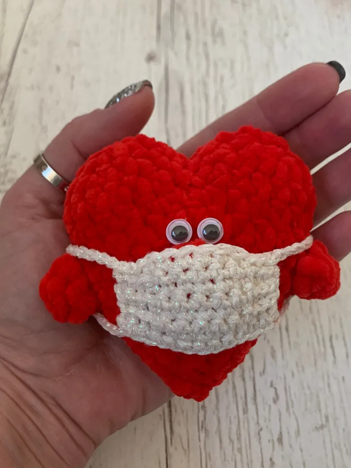Crochet red plush heart in mask personalised gift, small stuffed ornament, funny keychain Valentine’s Day, pendant on a car