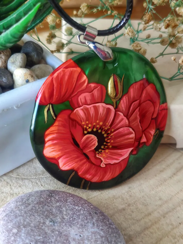 Floral Symphony: Captivating Red Poppy on Iridescent Green Nacre Pendant, a Stunning Blend of Nature and Artistry, Icon of Love and Passion