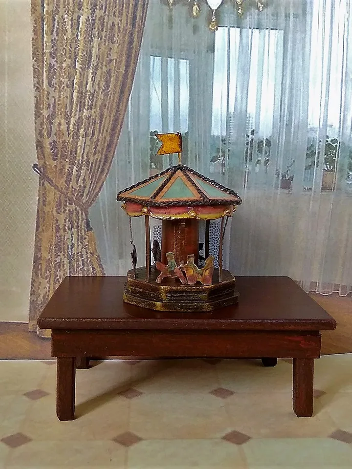 Miniature carousel. Dollhouse miniature.1:12 scale.