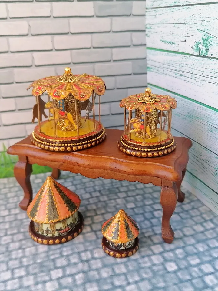 Miniature dollhouse carousel with gold trim. 1:12. Dollhouse miniature.
