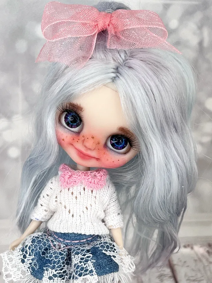 Small Blythe doll with blue eyes. Beautiful miniature Blythe doll with blue hair.