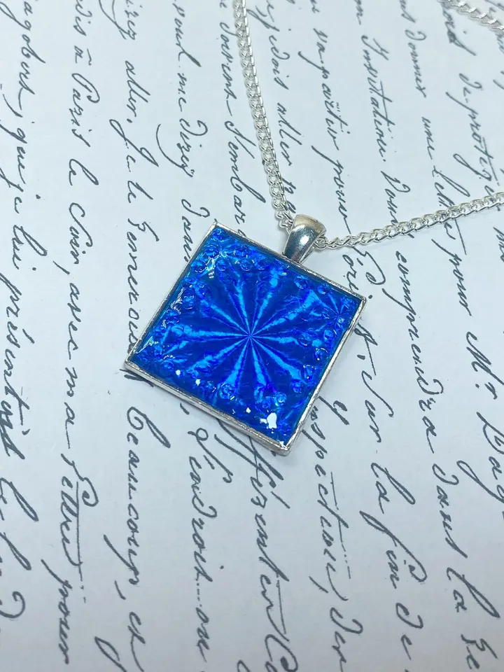 Bright blue 3D handmade pendant. Author's design. Handmade.