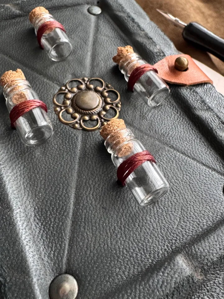 Genuine leather notebook with mini bottles on the cover. Grimoire, book of shadows, magical herbalist.