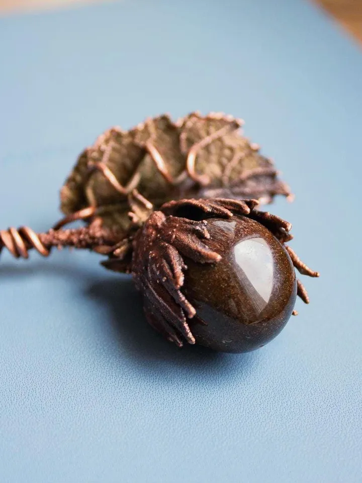 Unique handmade electroformed pendant made of natural leaves and twigs with natural tiger eye stone