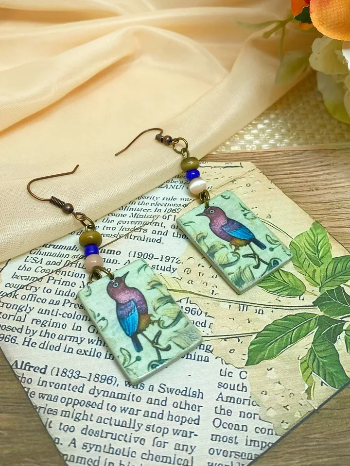 Vintage handmade earrings. Earrings with images of birds.
