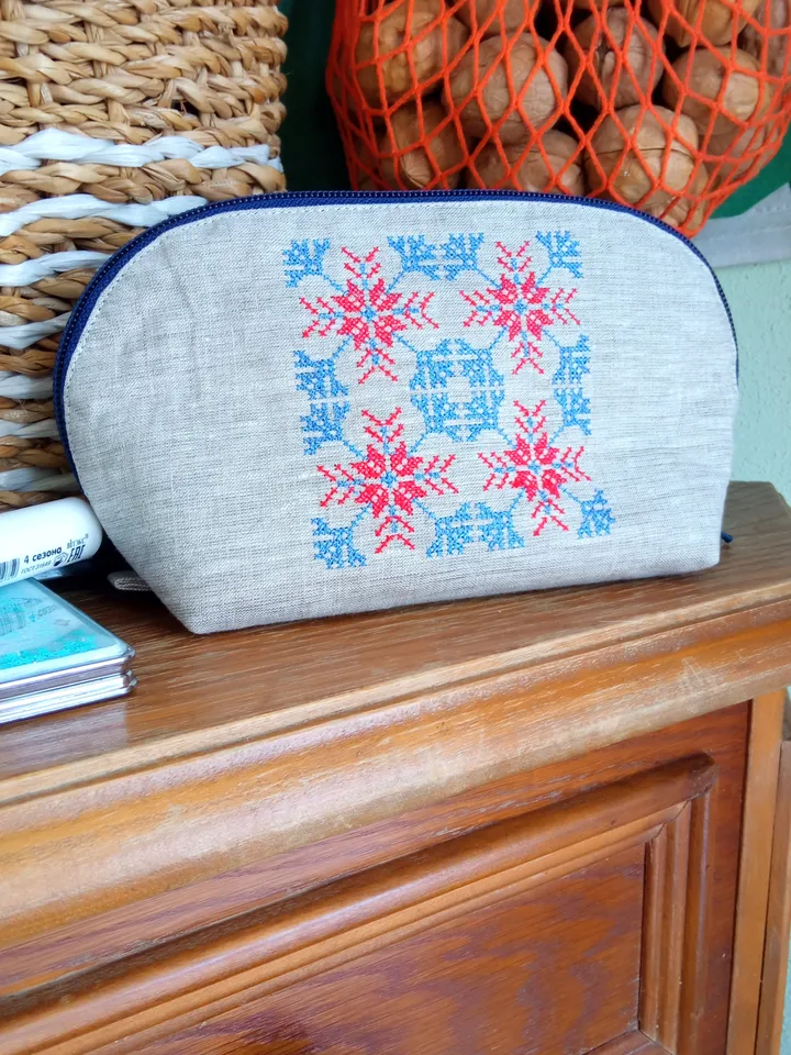 Cosmetic bag or pencil case made of linen with hand embroidery of a traditional Belarusian ornament