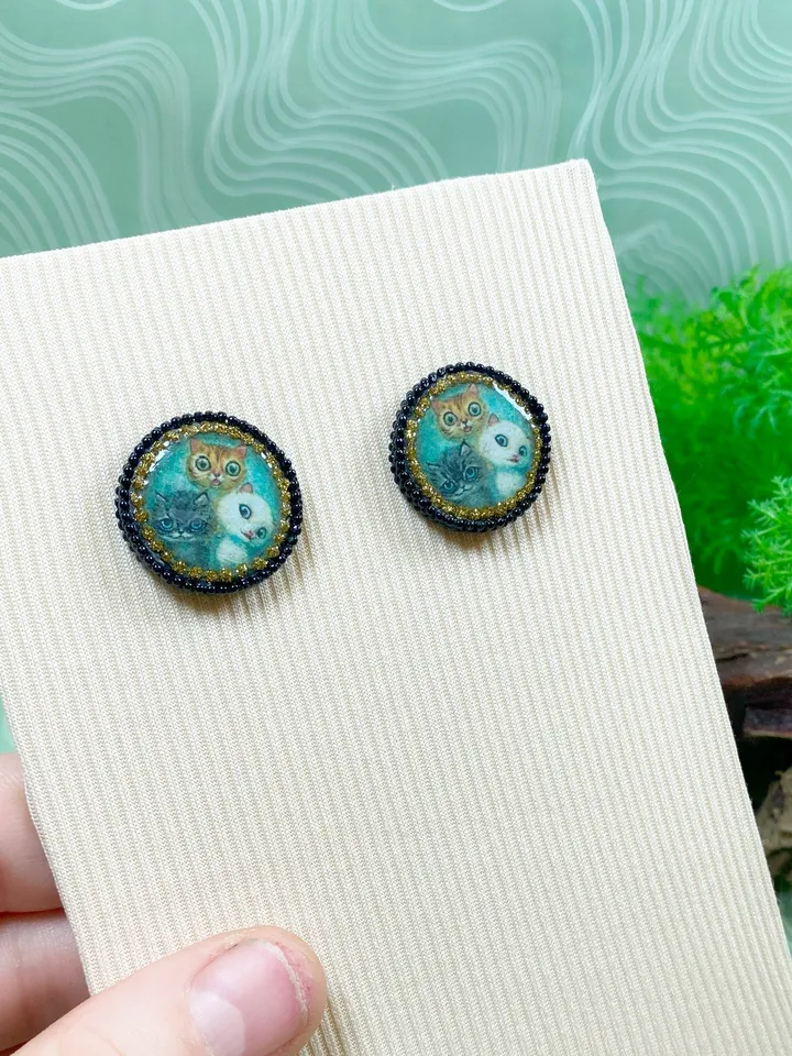 Handmade stud earrings. Earrings with images of cats.