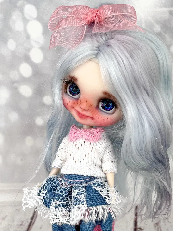 Small Blythe doll with blue eyes. Beautiful miniature Blythe doll with blue hair.