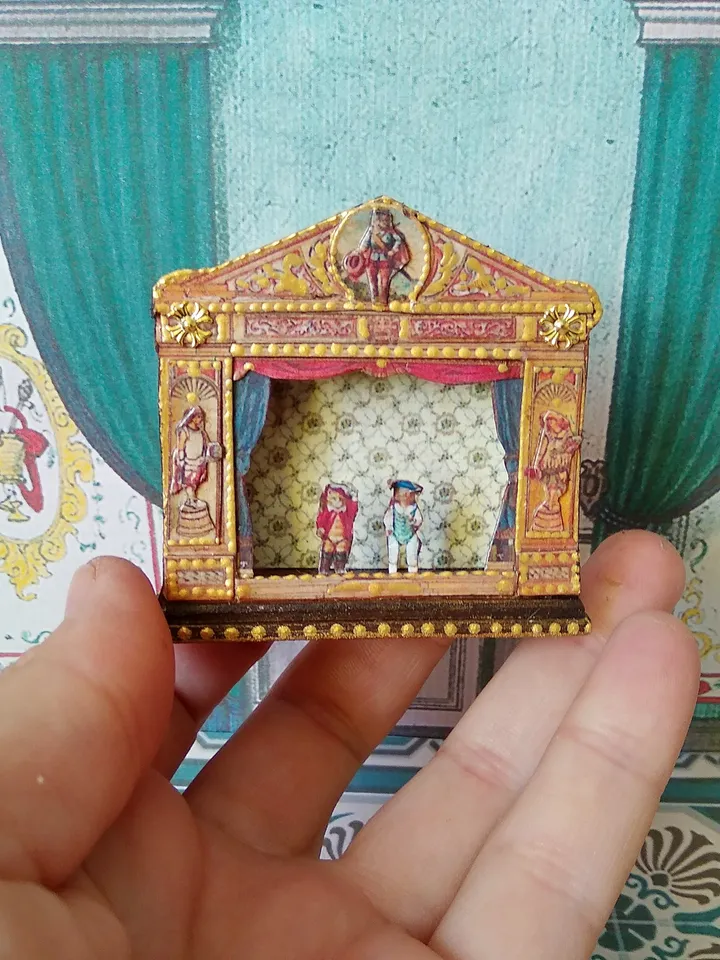Miniature puppet theater for doll houses.