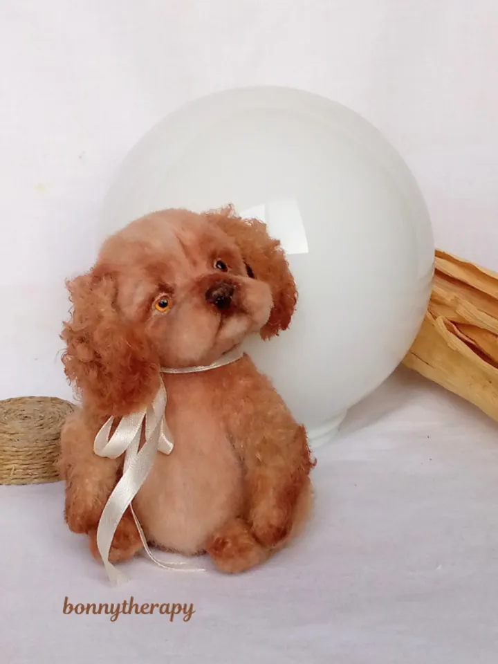 A cute puppy is waiting for you.