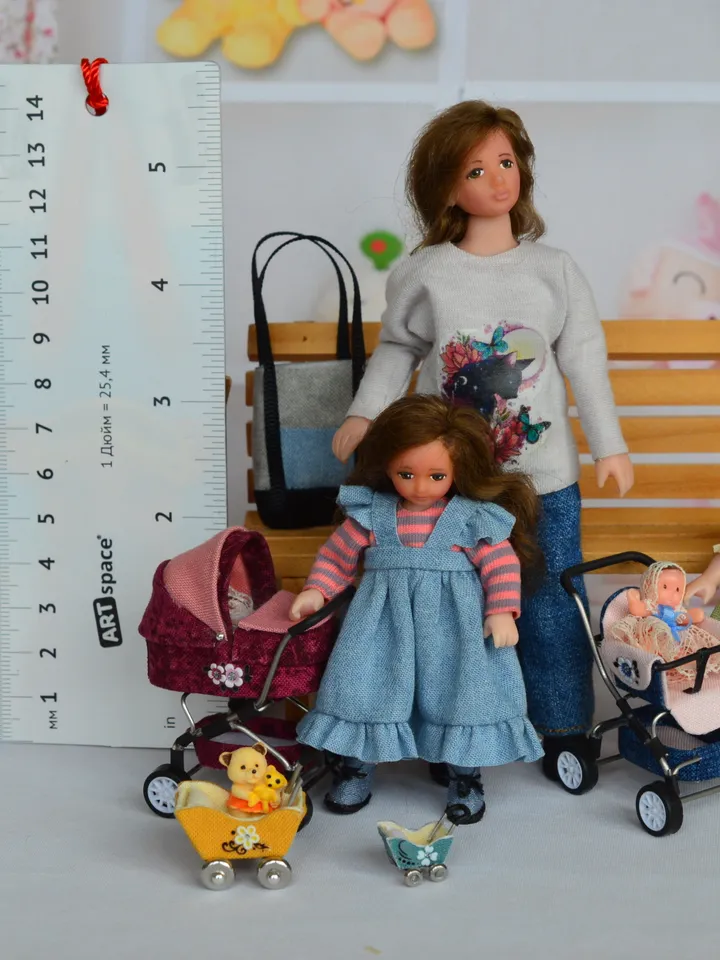Miniature doll stroller. 1:48 scale. Dollhouse toy. Baby stroller.