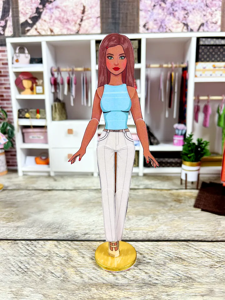 Printable paper doll with summer clothes