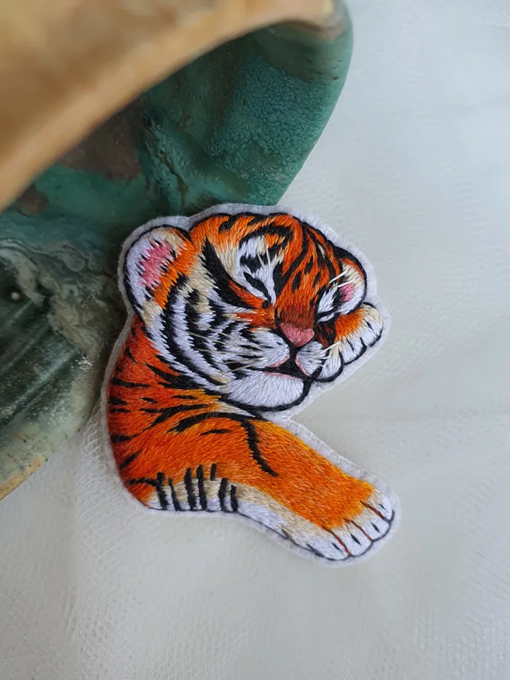Sleeping Tiger Cub Brooch. Hand-embroidered with satin stitch