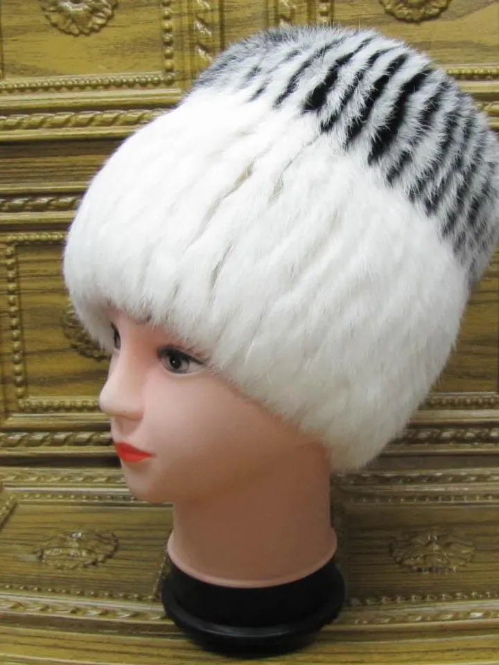 Fur hat for women made of natural rabbit fur. White warm fur hat. Winter hat for women, warm fur accessory. Natural rabbit fur