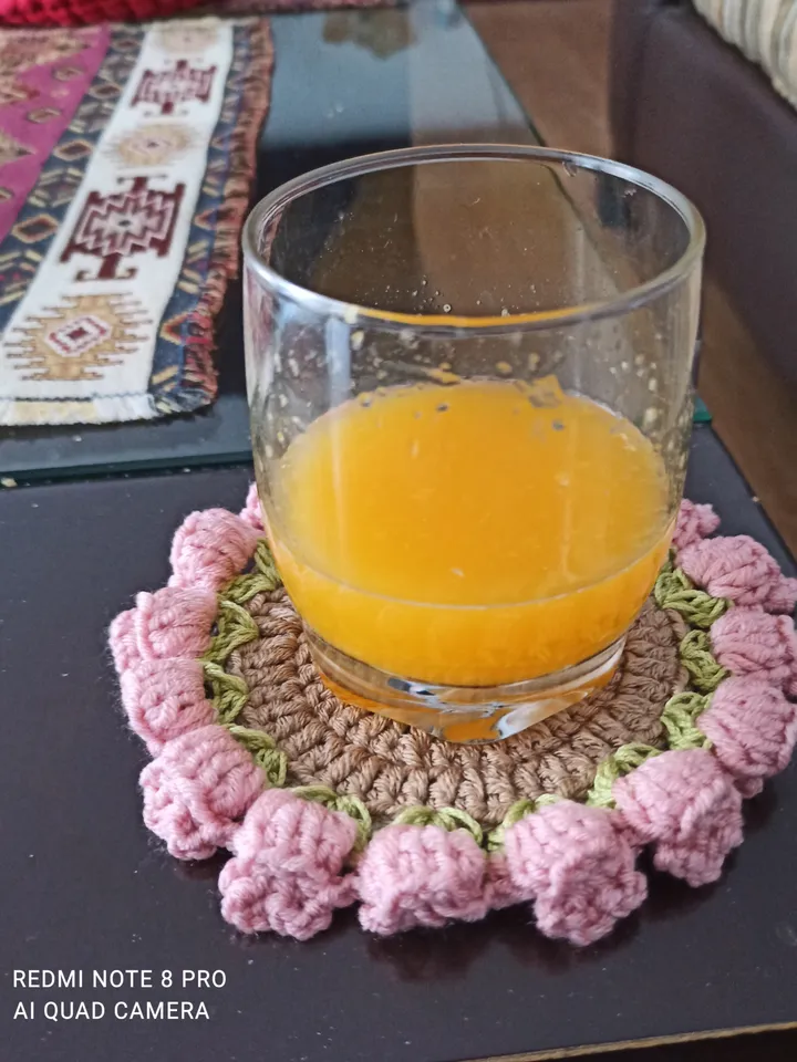 Crochet coasters with tulips