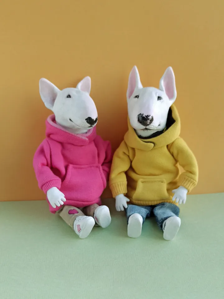 Bull Terrier doll in a pink sweater