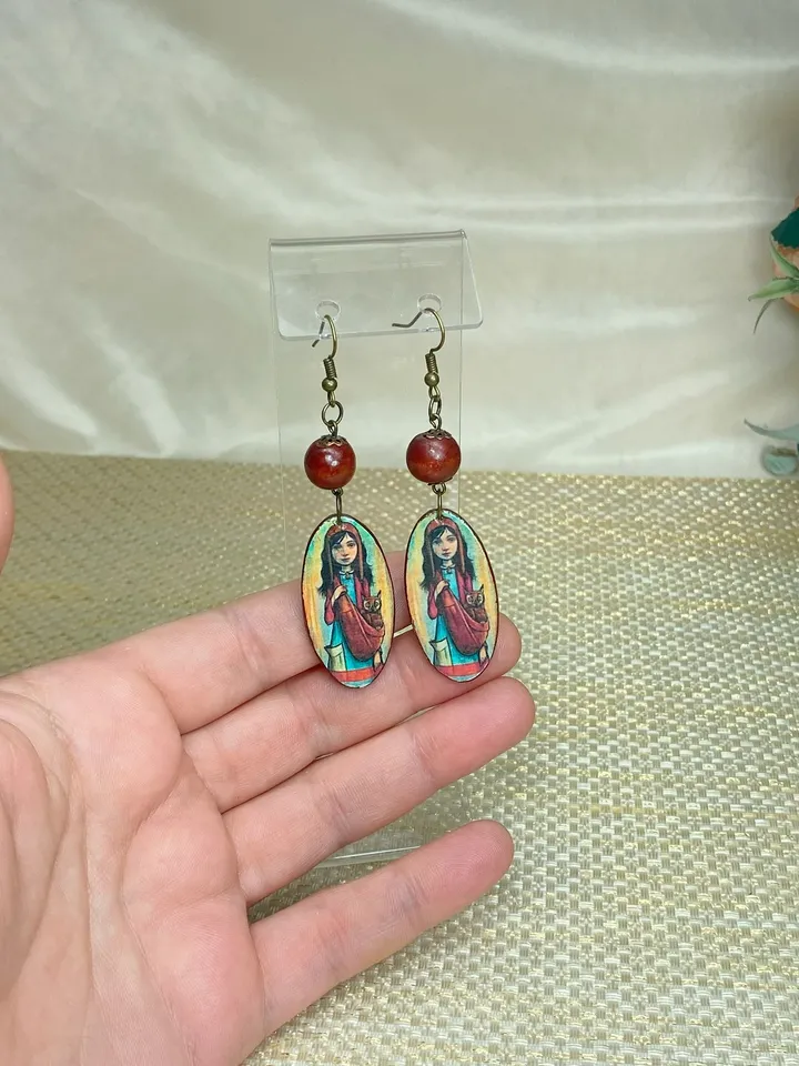 Handmade earrings. Author's design. Jewelry.Earrings with a picture of a girl. Wooden earrings.