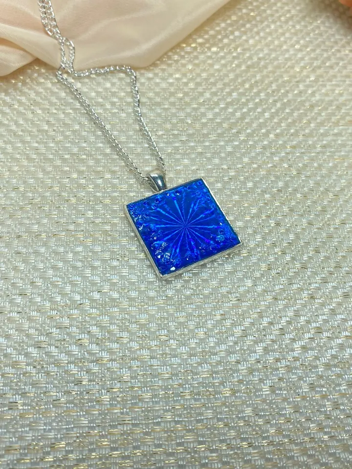 Bright blue 3D handmade pendant. Author's design. Handmade.