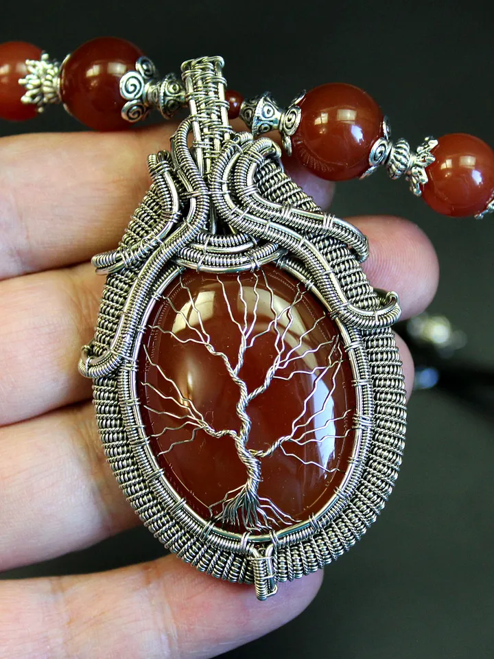 The Tree of Life necklace is handmade with natural birthstones.