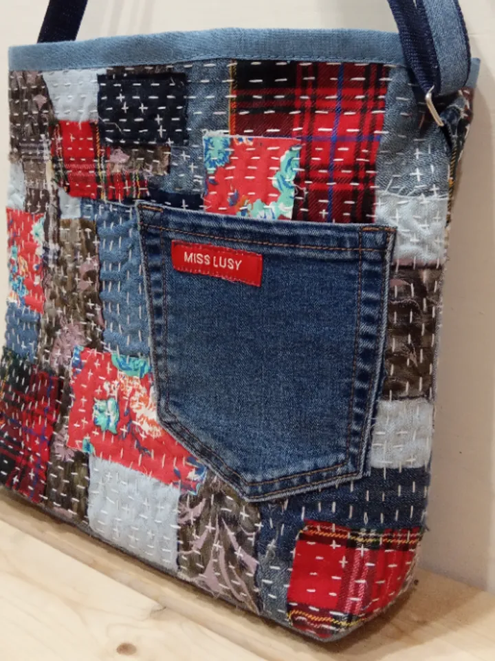 Pretty quilted handbag in the patchwork and boro style made of pieces of denim and cotton