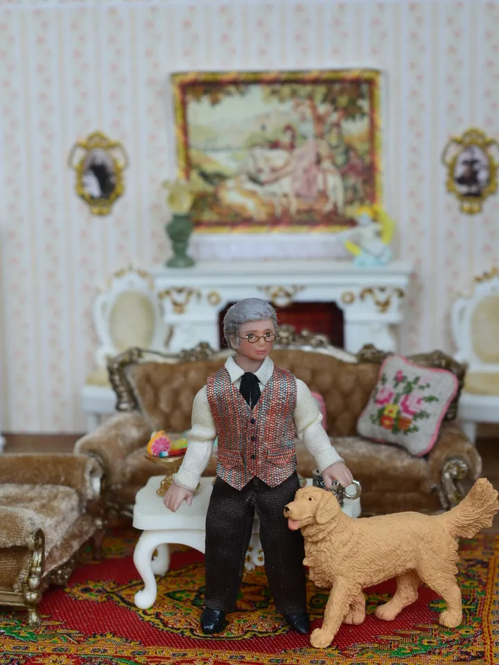 Man doll in 1/24 scale. Miniature doll for a dollhouse.