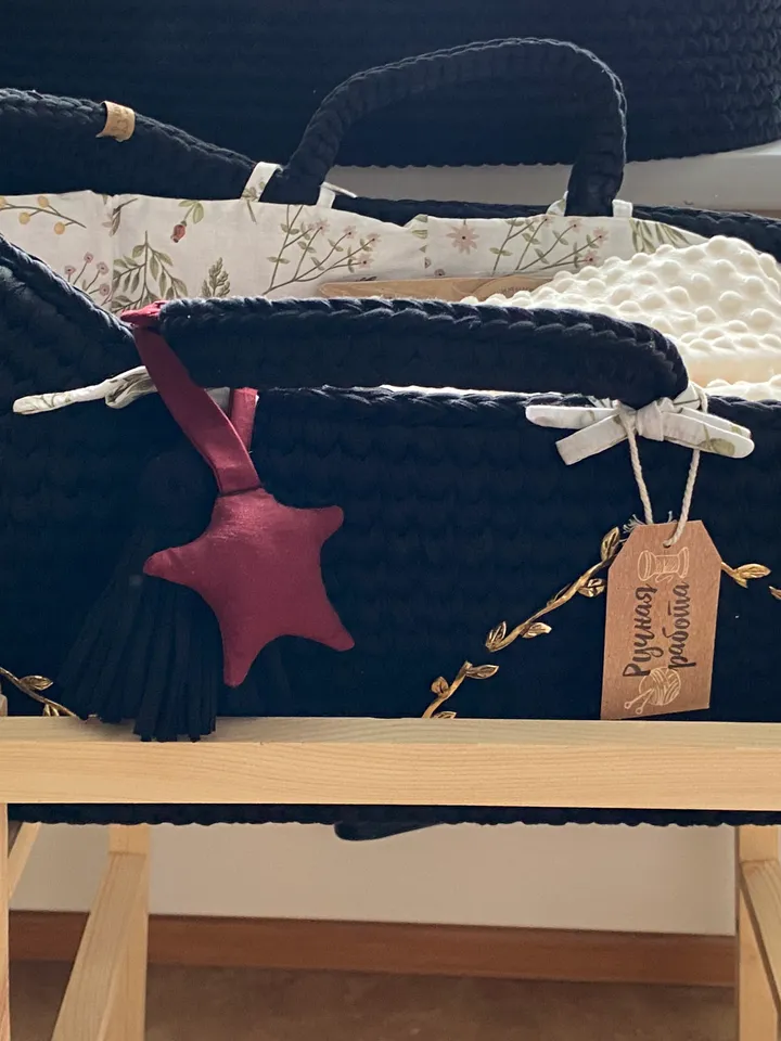 Knitted baby cradle