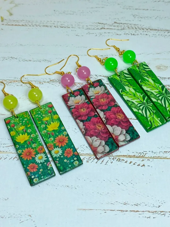 Earrings with luminous beads. Handmade jewelry.