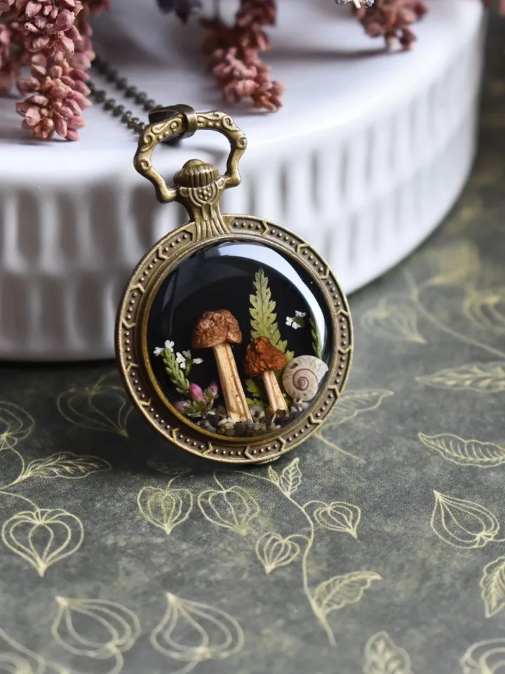 Pendant mushrooms in resin. Necklace with real mushrooms. Necklace with a forest composition.