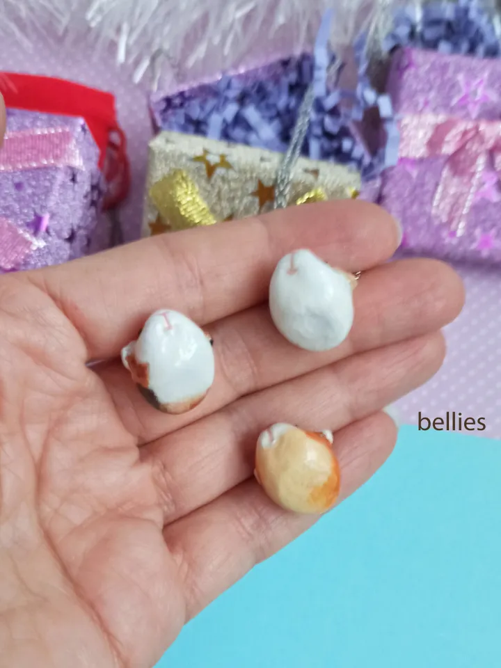 a Cute Guinea pig ball necklace in random color  (US discount)