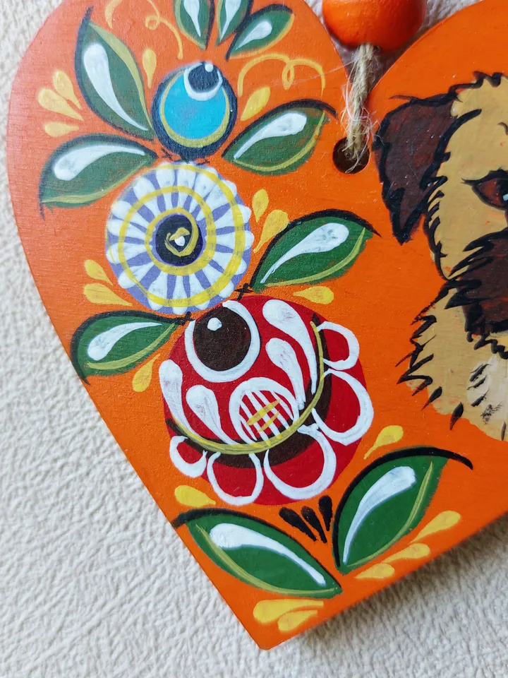 Wooden heart with painting. Border terrier